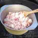 chopped bacon in a heavy bottomed pot over the BBQ