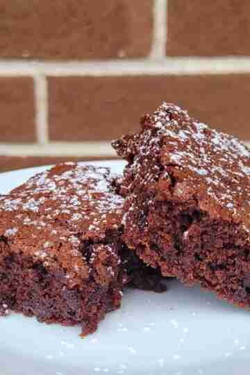 Squares of Buttermilk Brownies dusted with confectioners sugar