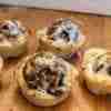 jerk meatball cupcakes on a cutting board