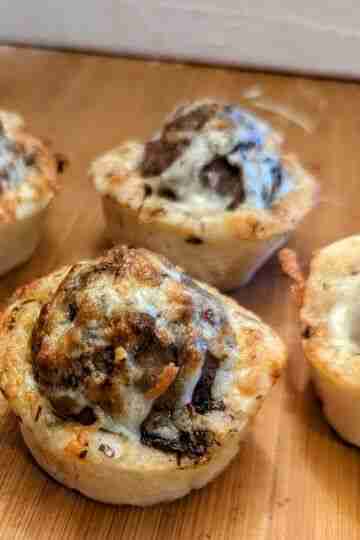 jerk meatball cupcakes on a cutting board