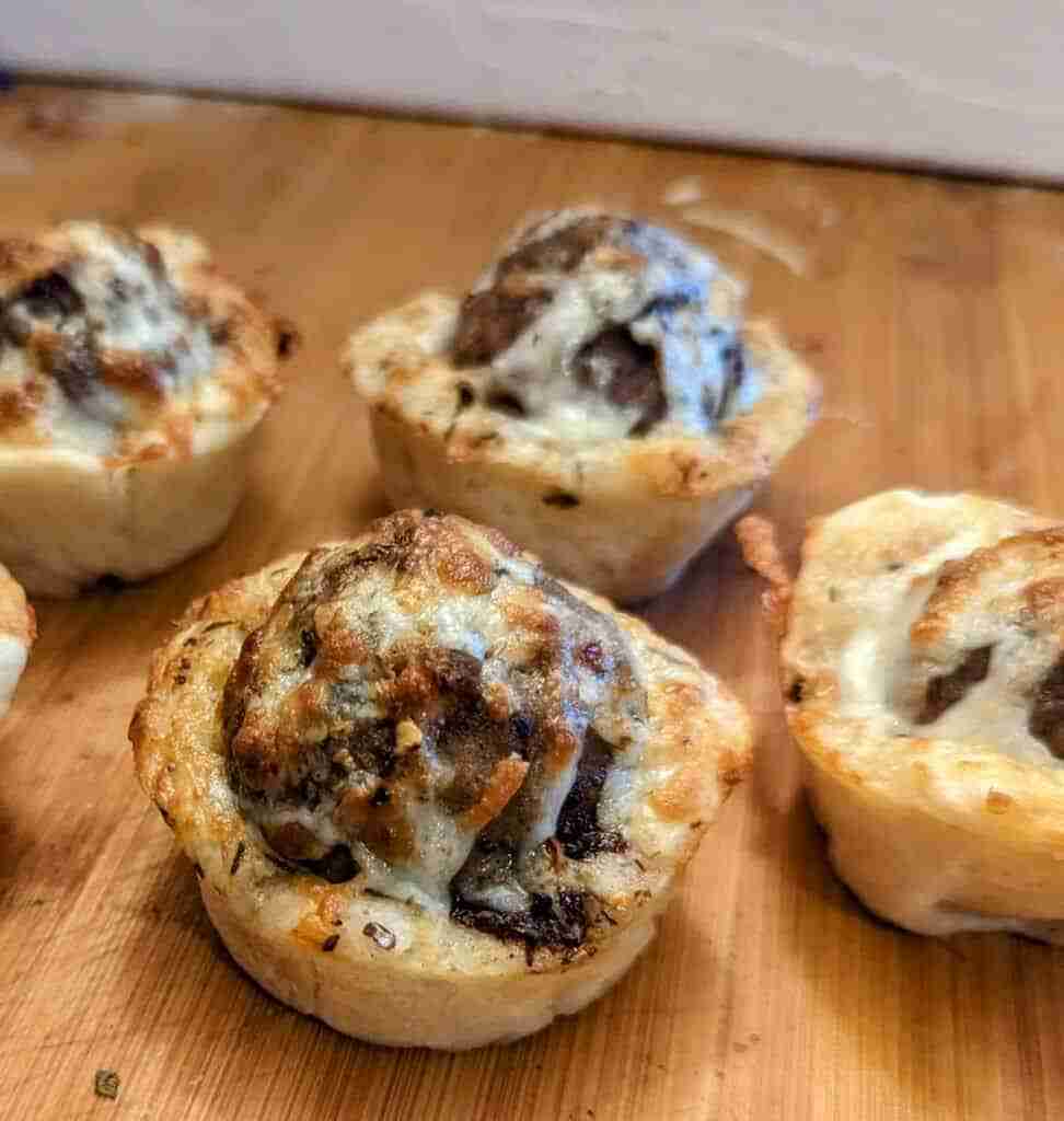 jerk meatball cupcakes on a cutting board