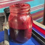 A jar of Blueberry BBQ sauce.