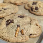 Pretzel Chocolate Chunk Cookies on parchment paper.