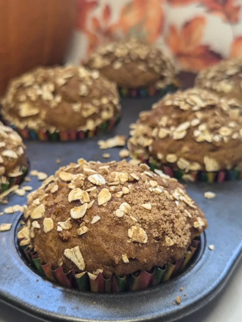 Pumpkin Muffins in a muffin pan.