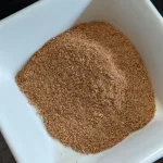 A bowl of rotisserie chicken seasoning.