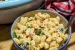A small bowl of chipotle ranch macaroni salad with a larger bowl barely seen in the back.