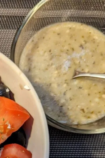 Greek salad dressing in a bowl.