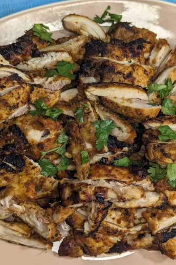 Mexican chicken with cilantro on top.
