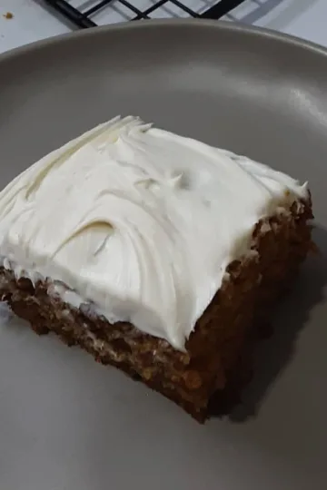 Pumpkin snack cake on a plate.