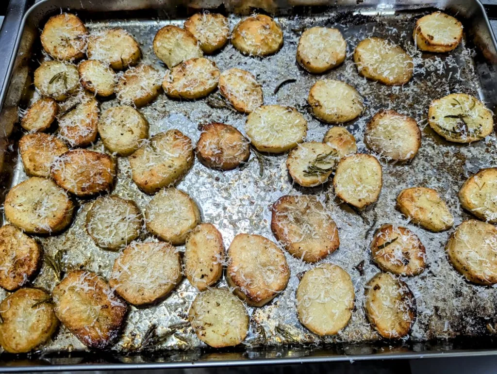 A pan of Parmesan melting potatoes.