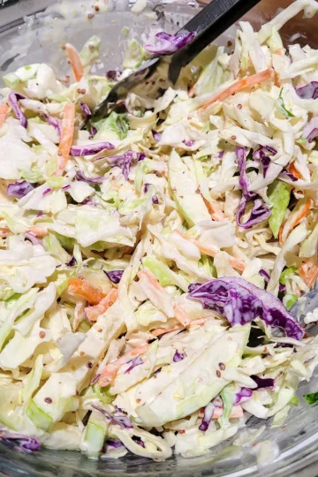 Apple coleslaw in a large bowl.