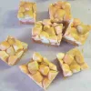 Seven pieces of Peanut Butter Marshmallow Squares.